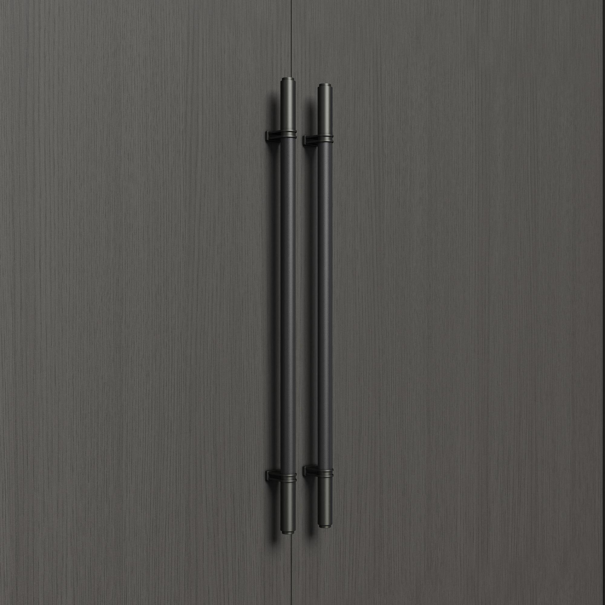 Cylindrical leather handle for hotel meeting room doors